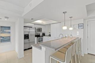 Luxurious Beachfront Condo with Resort Amenities - 4