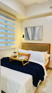 Calm Cove City at SMDC Style Condo - 1