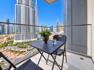 Vogue Vacation Homes, Downtown Boulevard Point near Burj Khalifa and Dubai Mall, One Bedroom Apartment with Burj Khalifa view from the Balcony and Access to all Amenities - 9