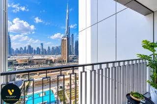 Vogue Vacation Homes, Downtown Views II with Easy Access to Dubai Mall Via a Climate Controlled Bridge, Two Bedroom Apartment with Balcony and Burj Khalifa View - 0