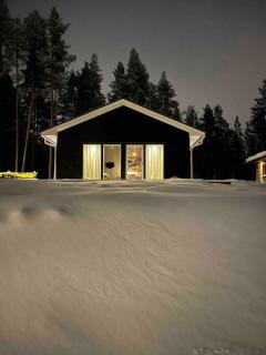 Vinterbonat gästhus med sjöutsikt i Piteå - 0