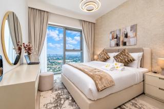 Vogue Vacation Homes, Downtown Views II with Easy Access to Dubai Mall Via a Climate Controlled Bridge, One Bedroom Apartment with Balcony and City View - 7
