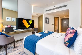 Vogue Vacation Homes, Business Bay Damac Maison Prive near Burj Khalifa and Dubai Mall, Studio Apartment with Balcony, Canal and City View, Access to all Amenities - 7