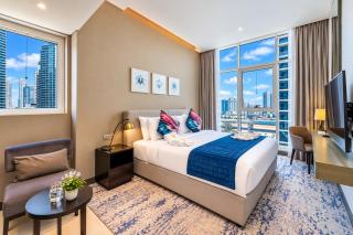 Vogue Vacation Homes, Business Bay Damac Maison Prive near Burj Khalifa and Dubai Mall, Studio Apartment with Canal and City View, Access to all Amenities - 9