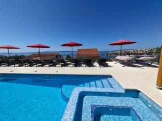 Heated swimming pool with stunning sea view terrace a8 - 5