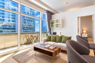 Vogue Vacation Homes, Business Bay - Bay Square close to Downtown Dubai Mall and Burj Khalifa, One Bedroom Apartment with Balcony and City view - 7