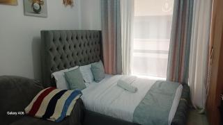 DavyJay Homes a warm cozy place with a touch of a home Near the airport accessible it's the place to Relax Reflect and Re-energize - 7