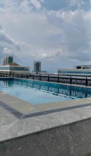 Premium 1BHK Green Velvet Suite with Pool Access - 7