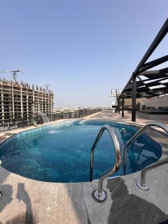 Premium 1BHK Green Velvet Suite with Pool Access - 2