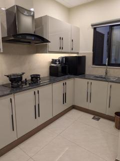 Premium 1BHK Green Velvet Suite with Pool Access - 1