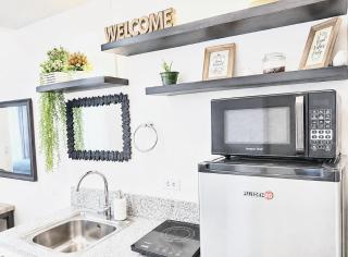 Cozy 1BR Tagaytay Condo with Balcony, Wi-Fi & Netflix near Sky Ranch - 1