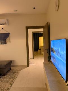 suite with bedroom and living room - 7