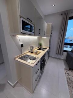suite with bedroom and living room - 4