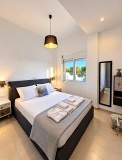 Enigma Boutique Houses Votsalo - Marmari - 2