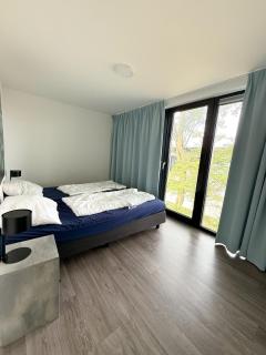 EuroParcs Bad Hoophuizen Villa Freiraum Strand Nr 34 - 1