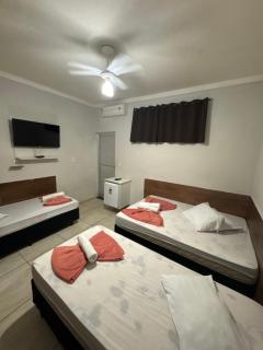 Pousada Quarto com tv,ar,frigobar,wifi e garagem - 7