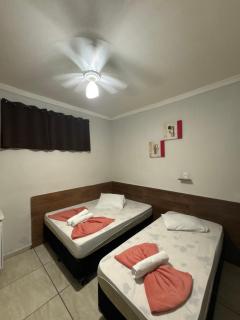 Pousada Quarto com tv,ar,frigobar,wifi e garagem - 8