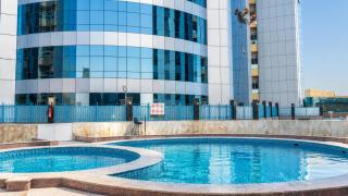The Oak Studio with Balcony & Sea View Pool & Gym - Ajman - 9