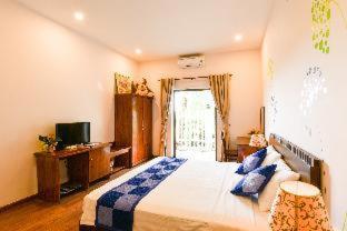 Tra Que Riverside Homestay, Хойан (фото 3)