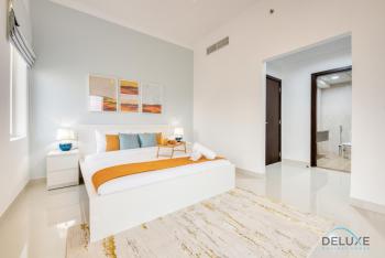 Sunny 1BR at Canal Residences West Dubai Sports City by Deluxe Holiday Homes, Dubaj (fotografie 2)