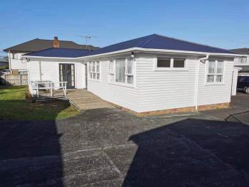 White weather board house, Auckland (Foto 2)
