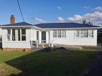 White weather board house, Auckland (Foto 4)