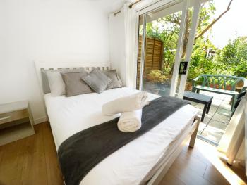 Luxurious House near Excel- Air Conditioning, 9 Beds, 2 Baths, Garden, fast WiFi, Londyn (zdjęcie 2)