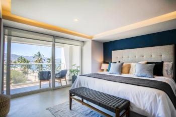 Upscale Corner Unit with Large Wrap Around Balcony and Pools, Puerto Vallarta (photo 3)