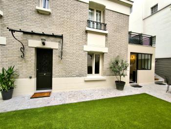 Montmartre en rez-de-jardin, Paris (photo 2)