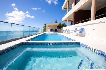 SeaDreams 4 - Luxury Condo with Shared Pool, Hot Tub, Rooftop Lounge, West Bay (foto 4)