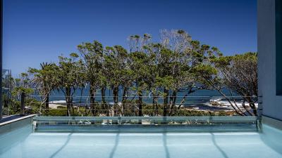 Blue Views Penthouse Beachfront Apartment with Pool