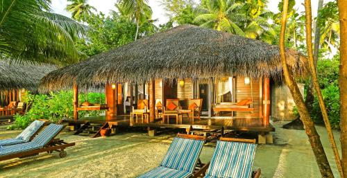 balkon/terras, Medhufushi Island Resort in Meemu Atoll