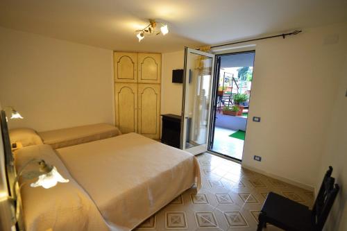 Al Geranio B&B Room Type - Triple Room with Private Bathroom Al Geranio B&B Room Type - Triple Room with Private Bathroom