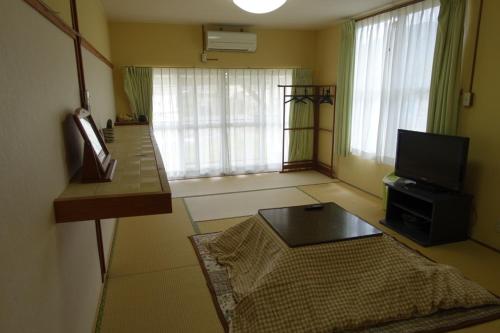 Japanese-Style Family Room with Shared Bathroom