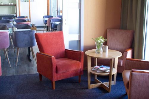 ห้องส่วนกลางสำหรับนั่งเล่น/ดูทีวี, Hotel Marena in แอนดิเนส