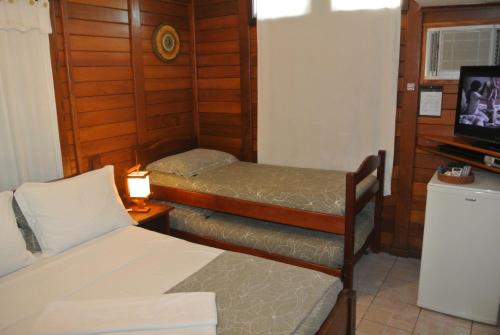 Caraguata Pousada Caraguata Pousada is perfectly located for both business and leisure guests in Setor Brasilia, S/N. The hotel has everything you need for a comfortable stay. All the necessary facilities, including sa