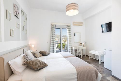 Hotel Oasis Located in Parikia, Hotel Oasis is a perfect starting point from which to explore Paros Island. The hotel offers a wide range of amenities and perks to ensure you have a great time. Service-minded sta