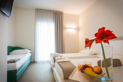 Hotel Amicizia Rimini - Tap to explore photos