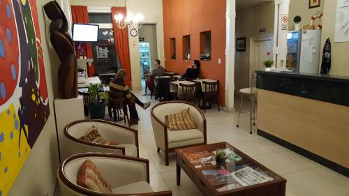 Shared lounge/TV area, Hagoth Hostel in Constitucion