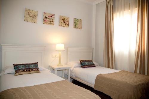 Apartamentos Vista Real Stop at Apartamentos Vista Real to discover the wonders of La Linea de la Concepcion. The hotel offers a wide range of amenities and perks to ensure you have a great time. Service-minded staff will we