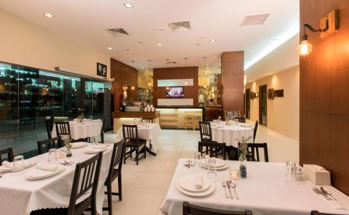 Restaurant, Swiss Hotel Apartment in Kuala Belait