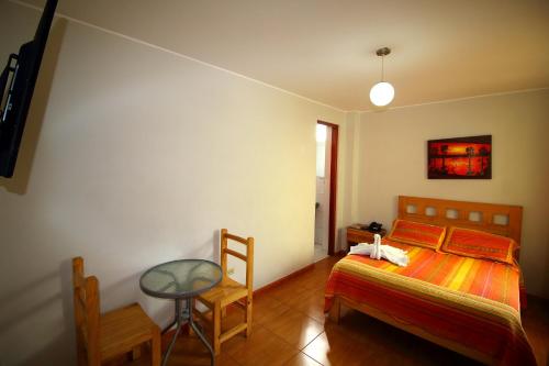 Guestroom, Takora Inn in Tacna