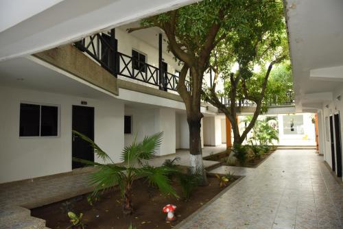 Dārzs, Hotel El Emigrante in Puerto Colombia