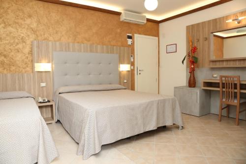Hotel Ambra - Tap to explore photos