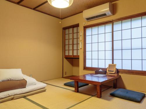 Gion Ryokan Q-beh - Hostel style - Tap to explore photos