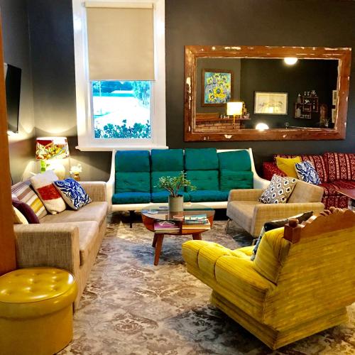 jaettu olohuone/TV alue, Vine Valley Inn in Hunter Valley