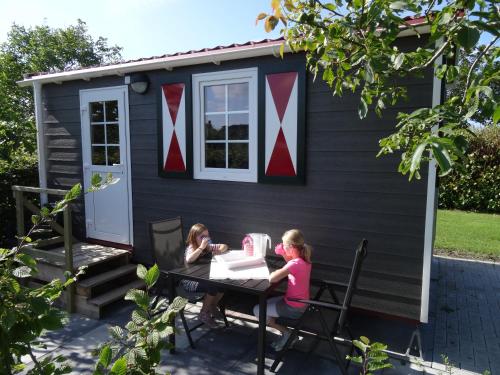 Erkély/terasz, zeeuwse chalet voor 2 personen in Serooskerke (Zeeland)