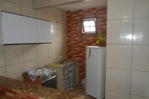 Konyha, Quitinetes dos Ipes in Barra de Sao Joao (Rio de Janeiro)