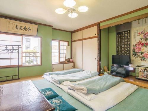 Japanese-Style Family Room with Shared Bathroom