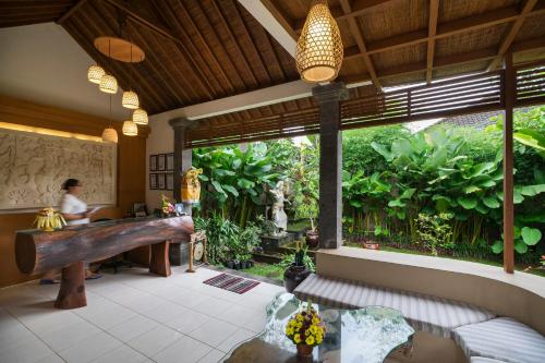 德薩克普圖普特拉小屋 Desak Putu Putera Cottages
